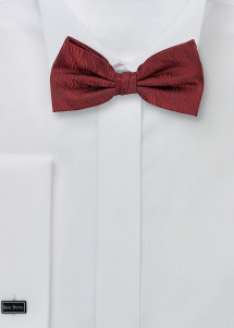 Papillon da uomo in superficie rosso scuro