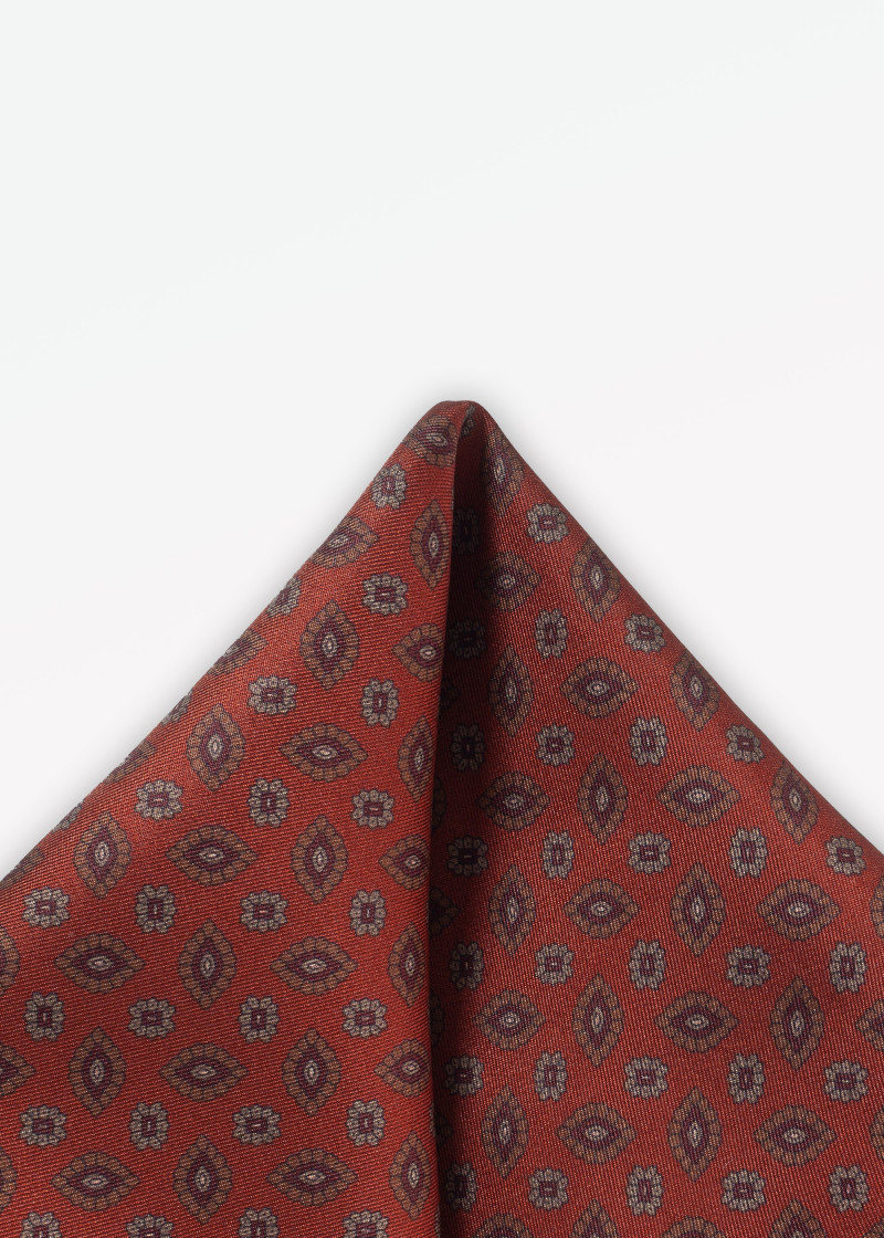 Ornamenti floreali in stoffa rosso ruggine