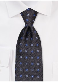Cravatta in seta con motivo floreale blu...