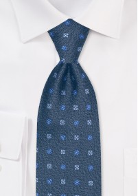 Cravatta in seta con motivo floreale blu...