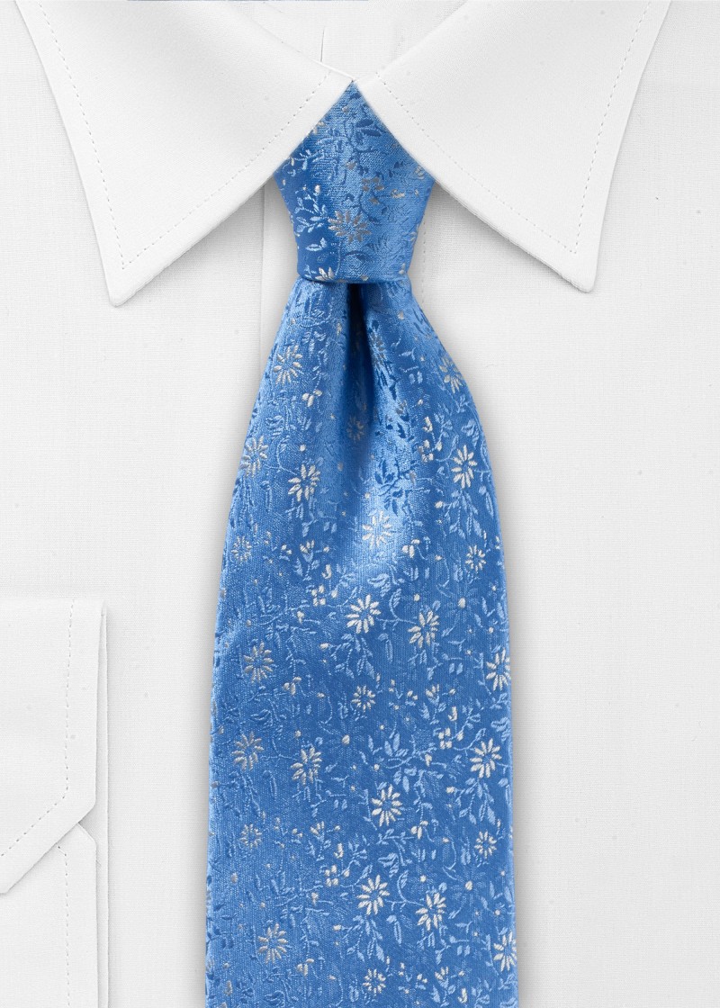 Cravatta in seta blu con elegante motivo floreale