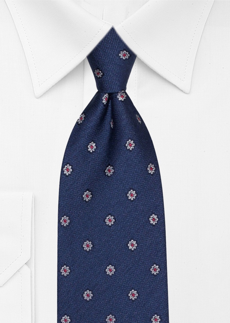 Cravatta in seta blu scuro con motivo floreale di